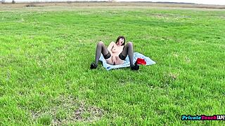 sexy slavic brunette in red dress fucks pussy with toy outdoors... oops black lingerie slips!