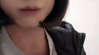 Ting Xuan heads outdoors, pees publicly, drops her skirt and strokes her ladyboy cock in the park.