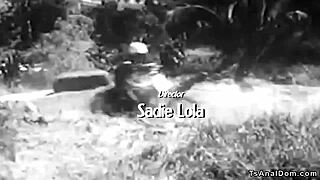 Tranny biker shoves anal toys into muscled male's ass