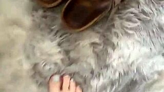 friday girl in leatherskirt bares feet and socks