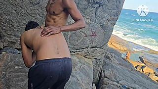 brazilian bodybuilder stuffs two cocks in ass publicly on beach