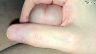 chubbykaot lounges in bed watching porn with close-up chubby belly flashes