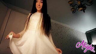 Sweet babe in white dress undresses for solo fingering fun