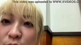 shy asian bookworm sneaks masturbation fingers in library next to reading stranger