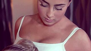 classy babe spreads legs as oiled masseuse fingers her tattooed pussy close-up in sensual lesbian massage