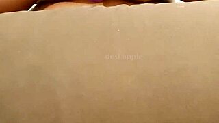 Sexy maid lifts uniform to flash her huge bouncy boobs teasingly in the room