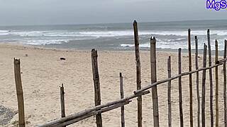 sexy african slut flashes naughty at beach party