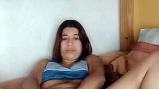 selene rubs cream over her petite tits and ass