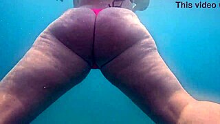 Pawg teen in thong bikini swims underwater curves jiggle in public bath 4k close-up