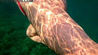 Pawg teen in thong bikini swims underwater curves jiggle in public bath 4k close-up