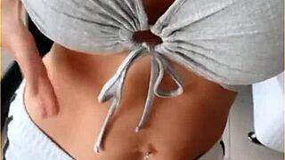 housewife slips open her shirt for playful tit flashing tease around the house