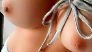 housewife slips open her shirt for playful tit flashing tease around the house