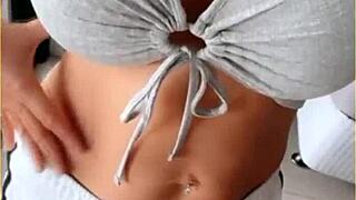 housewife slips open her shirt for playful tit flashing tease around the house