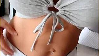 housewife slips open her shirt for playful tit flashing tease around the house