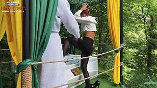 Redhead receptionist in heels skirt pantyhose baths then sucks client cock for cumshot