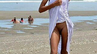 ever wonder what happens when a skinny latina model strips nude on public beach?