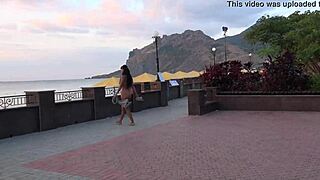 Woman strolls nude through busy public streets