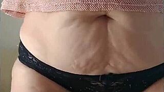 fitness stepmom in see-through thong tempts during kitchen workout videos