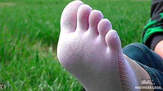 awww my cute curly goddess feet spreadin in white socks n jeans on spring grass