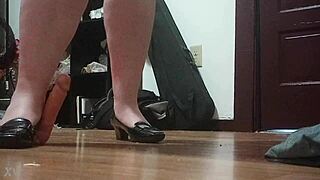 Hey, she's crushing that throbbing cock under her sharp heels! 👠🍆💥🔥