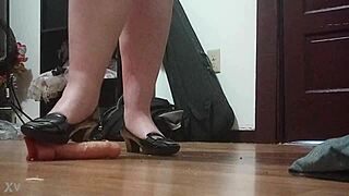 Hey, she's crushing that throbbing cock under her sharp heels! 👠🍆💥🔥