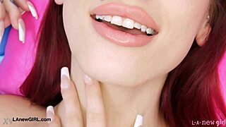 red haired model strips down to reveal her full nude sex body on sofa