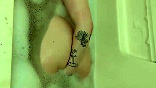 chubby babe spreads oiled legs in bathtub for multiple orgasms