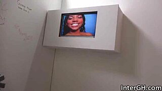 Ebony babe deepthroats massive cock through gloryhole interracial 😩💦