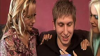 Blonde milf joins threesome for lesbian fingering play