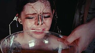 imagine emo goth whore bound in garage, face tied, crying from rough piss punishment