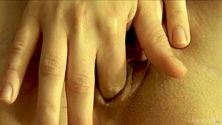 Blonde Nadin Fills Tight Pussy and Ass with Fingers in Bedroom Solo