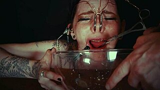 imagine emo goth whore bound in garage, face tied, crying from rough piss punishment