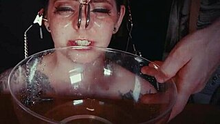 imagine emo goth whore bound in garage, face tied, crying from rough piss punishment