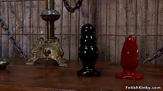 ebony slave bound for kinky lesbian bdsm as mistress fists ass with acrylic toy and rimjobs