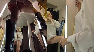 look at this upskirt on that blonde's pussy and big tits in the fitting room
