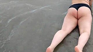pregnant african teen belinha sensually poses her big belly on beach