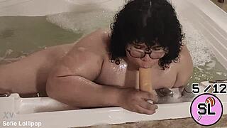 trans hottie plays with herself in the hot tub massage vibes