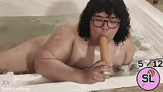 trans hottie plays with herself in the hot tub massage vibes