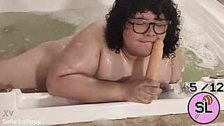 trans hottie plays with herself in the hot tub massage vibes