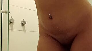ruivinha fingers her tight ass and pussy in hot shower orgasm
