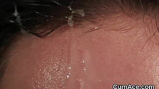 Horny Stunner Swallows Jizz Facial in Intense Bukkake Blowbang