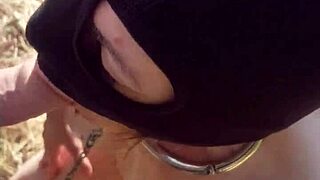 her humiliated garage slave gets chained outdoors. bent over doggystyle in stockings for maledom use.