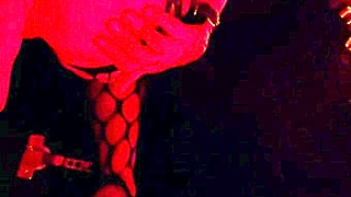 mature babe's shaved asshole gapes wide on anal fuck machine in fishnets