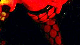 mature babe's shaved asshole gapes wide on anal fuck machine in fishnets