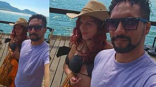 following a latina tourist around the beach in brasil
