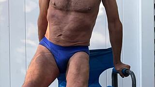 oh man deep pelvic stretches in blue briefs hugging my cock on that chair legs wide