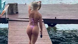 she slips into a daring micro bikini for the beach