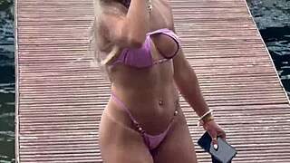 she slips into a daring micro bikini for the beach