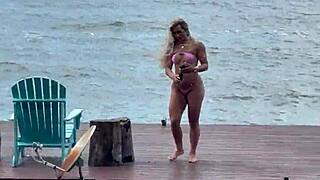 she slips into a daring micro bikini for the beach