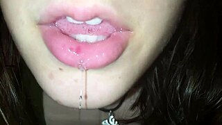 she spits all over him in this fetish clip